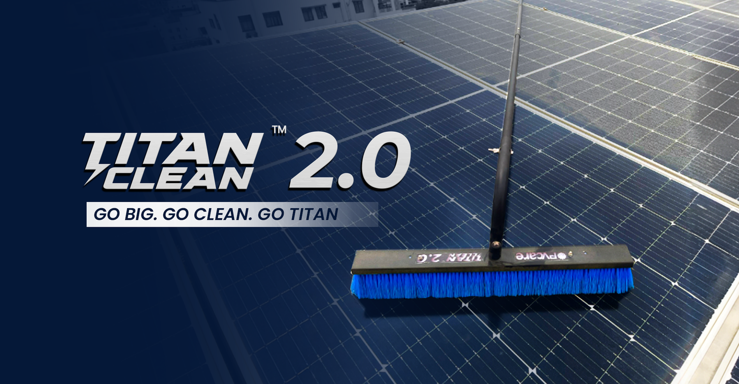 Titan Clean 2.0 cleaning brush on a solar panel with branding text.